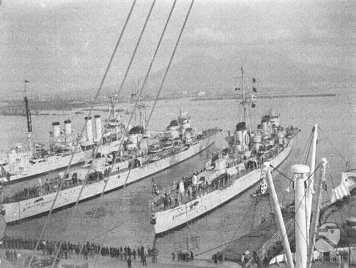 Naples two large Italian warships anchored in the port of Naples next to an American ship