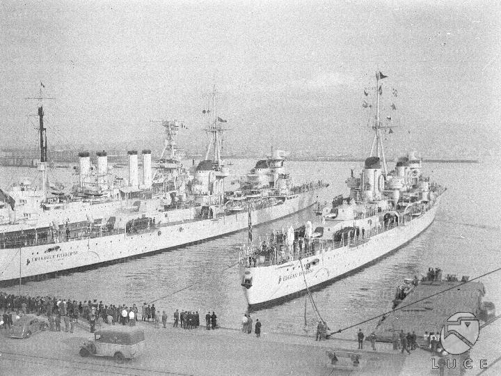 Naples two large Italian warships anchored in the port of Naples next to an American ship