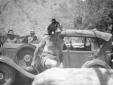 Achille Starace sorpreso, a torso nudo, durante un ...