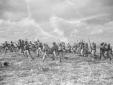 Legionari all'assalto in una zona di guerra
