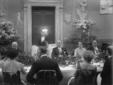 Mussolini seduto a tavola durante il pranzo in ono ...