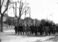 Mussolini, accompagnato da un gruppo di gerarchi,  ...