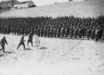 Mussolini, accompagnato da autorit in uniforme de ...