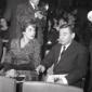 Renato Rascel e Huguette Cartier seduti in platea