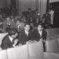 Franco Citti seduto in platea, in compagnia di due ...