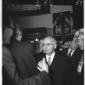 Einaudi e la signora Ida che entrano nel cinema tr ...
