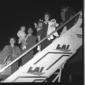 Gruppo di famiglia, accompagnato da un'hostess, �  ...