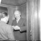 Saragat colto sorridente insieme a un collega in a ...