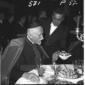 Il cardinale Costantini seduto a tavolain occasion ...
