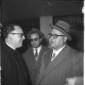Gonella e un sacerdote conversano. Mezza figura