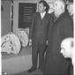 Taviani e Nixon colti in una sala della mostra dov ...