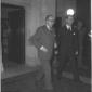 Walter Hallstein accompagnato da un uomo in un cor ...