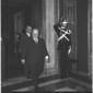 Attilio Piccioni e Luigi Gui ripresi mentre entran ...