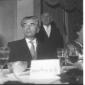 Giovanni Battista Angioletti, seduto a un tavolo i ...