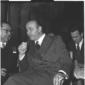 Giuseppe Petrilli seduto su una sedia discute con  ...