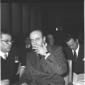 Giuseppe Petrilli seduto su una sedia discute con  ...