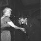 Aldo Moro bacia la mano della signora Zellerbach.  ...