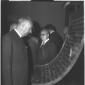 Il ministro Taviani osserva delle monete esposte i ...