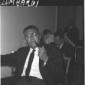 Lombardi ripreso seduto su una sedia mentre fuma l ...