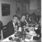 Diverse persone, tra cui Guttuso e la moglie(?), s ...