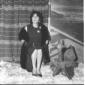 Anna Magnani ripresa seduta sorridente in occasion ...