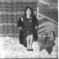 Anna Magnani ripresa seduta sorridente in occasion ...