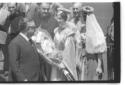 Leone, alcuni religiosi e diverse donne in costume ...