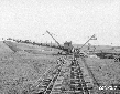 Escavatore Tosi n. 2 nel lavoro di scavo del canal ...